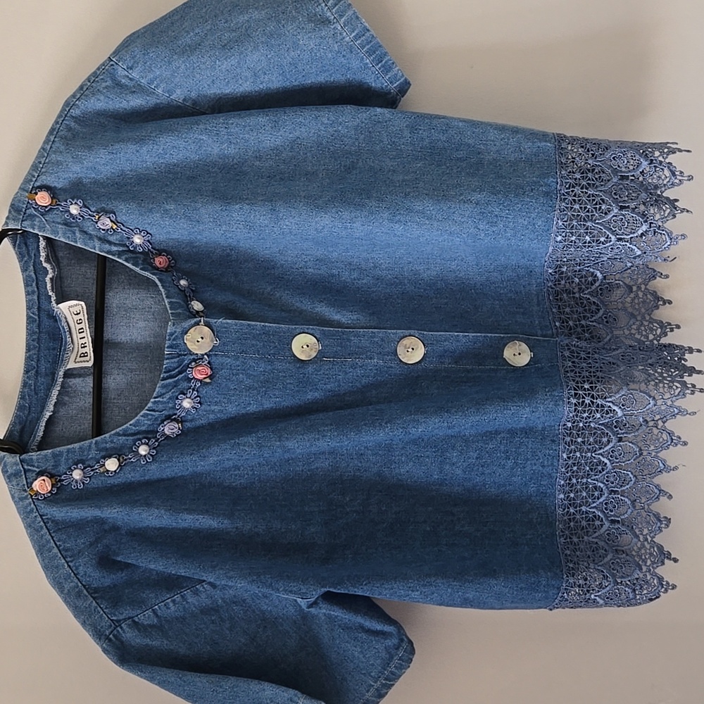 Denim blouse with embroidered flowers and pearls